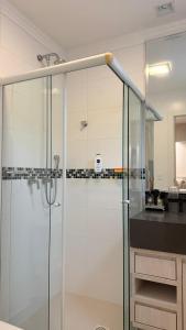 Phòng tắm tại Apartamento luxo Praia Meia Praia