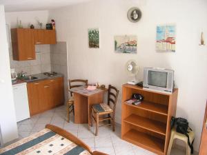Kuchyň nebo kuchyňský kout v ubytování Apartmani Plach