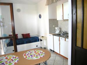 Kuchyň nebo kuchyňský kout v ubytování Apartmani Plach
