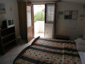 Postel nebo postele na pokoji v ubytování Apartmani Plach