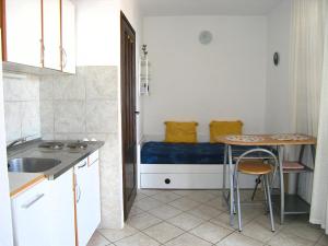Kuchyň nebo kuchyňský kout v ubytování Apartmani Plach