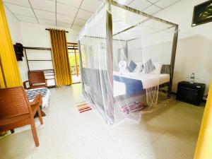 哈伯勒内Hotel Oleena的一间塑料床的房间