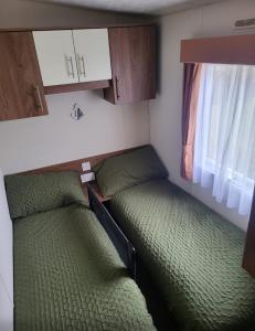 Ένα ή περισσότερα κρεβάτια σε δωμάτιο στο River View Retreat 3 Bedroom Pet Friendly in Clarach Bay