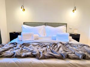 En eller flere senge i et værelse på Cortela Dimora Scaligera