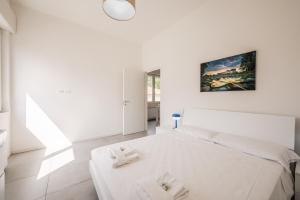 Ένα ή περισσότερα κρεβάτια σε δωμάτιο στο Tosa Apartment - Free WiFi, Air Conditioning & Private Parking