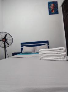 Ένα ή περισσότερα κρεβάτια σε δωμάτιο στο Cuba linda, alojamiento, hospedaje 1 habitación +5 φωτογραφίες