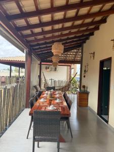 En balkon eller terrasse på Sunshine Chalet - Cozy Stay in Santo Amaro - Dunas Village Residence