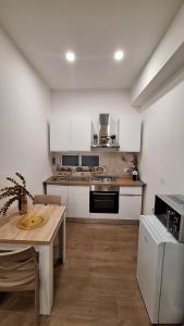 Η κουζίνα ή μικρή κουζίνα στο Siciliano Palace - Deluxe Apartments & Spa