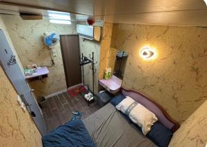 Postel nebo postele na pokoji v ubytování 金葉別墅