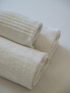 Postel nebo postele na pokoji v ubytování Suite Brume - Maison les Arcades au pied de la gare de Charleville-Mézières