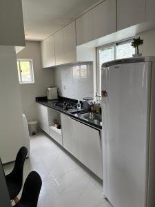 Køkken eller tekøkken på Itapuã Beach