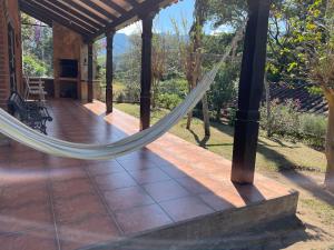 Zahrada ubytování Cabaña Juanita en Achiras + 5 fotografií