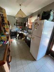 Kuchyň nebo kuchyňský kout v ubytování Cabaña Juanita en Achiras