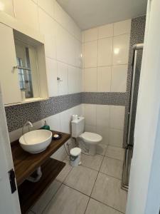 Ένα μπάνιο στο Apartamento com Ar no centro de BH