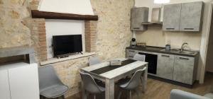 Η κουζίνα ή μικρή κουζίνα στο La Casa dei DOGI