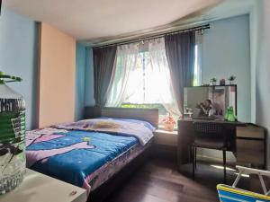 a bedroom with a bed and a desk and a window at Valley Mountain View&City Proximity Golden Eight Apartment in Ban Phlu Yai +12 photos