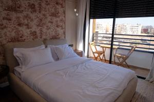 Ένα ή περισσότερα κρεβάτια σε δωμάτιο στο Luxury studio with terrace