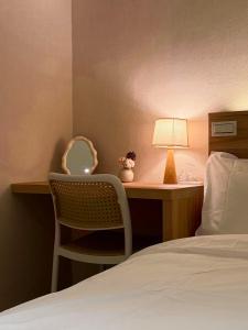 Postel nebo postele na pokoji v ubytování 小暮行旅 Twilie Stay