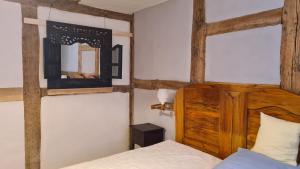 Postel nebo postele na pokoji v ubytování Lunow 1