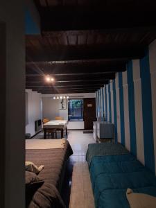 Ένα ή περισσότερα κρεβάτια σε δωμάτιο στο Tierra De Mestizos