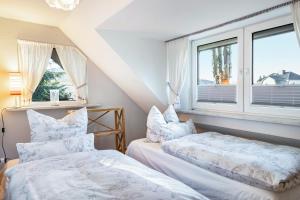 Кровать или кровати в номере Ferienwohnung S Viering