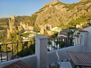 a balcony with a view of a mountain at La Mocha Casa Rural - La Casa de María in La Iruela