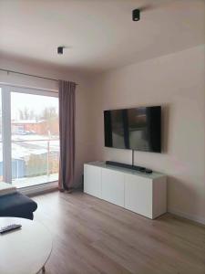 Μια τηλεόραση ή/και κέντρο ψυχαγωγίας στο Modern 2023 apartment