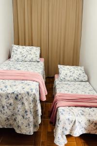 Una cama o camas en una habitación de Apto no centro de Belém Nos altos