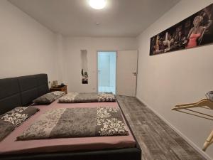 Ένα ή περισσότερα κρεβάτια σε δωμάτιο στο Weierbacher Panorama