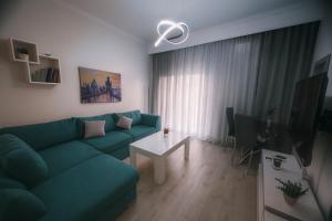 TV a/nebo společenská místnost v ubytování Serres city center modern apartment (Monika)