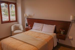 Ένα ή περισσότερα κρεβάτια σε δωμάτιο στο Amazon Luxury