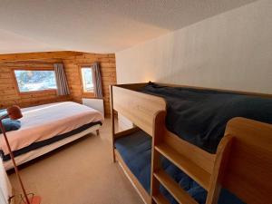 Postel nebo postele na pokoji v ubytování Billy Avoriaz - Chalet Mont Oya