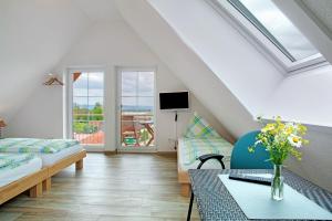 Ένα ή περισσότερα κρεβάτια σε δωμάτιο στο Biohof Stotz