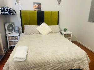 Giường trong phòng chung tại Annikaguesthouse