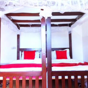 Ένα ή περισσότερα κρεβάτια σε δωμάτιο στο Hatupe +15 φωτογραφίες