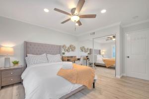 En eller flere senge i et værelse på Arcadia Family House