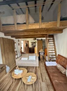 En eller flere senge i et værelse på Casa Colón, Acogedor Loft en Sevilla