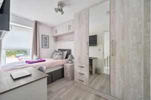 Ένα ή περισσότερα κρεβάτια σε δωμάτιο στο Single Room with WiFi & Amenities In Reading