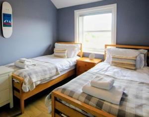 Ένα ή περισσότερα κρεβάτια σε δωμάτιο στο Nina's Cottage - Southwold