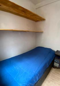 Ένα ή περισσότερα κρεβάτια σε δωμάτιο στο Habitación Individual Luz & Calma