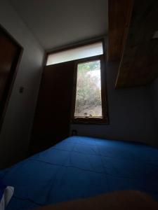 Ένα ή περισσότερα κρεβάτια σε δωμάτιο στο Habitación Individual Luz & Calma