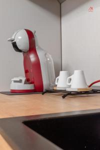 Příslušenství pro přípravu čaje a kávy v ubytování Sunny Grand Chalet Apartment + 21 fotografií