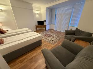 Una cama o camas en una habitación de Hotel Tia