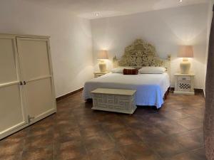 En eller flere senge i et værelse på Santa Noche Chalet Vacacional