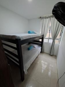 Postel nebo postele na pokoji v ubytování Apartamento en condominio con piscina + 9 fotografií