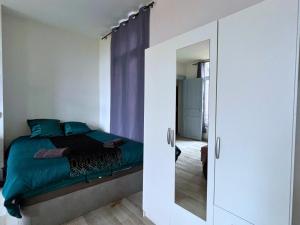 Ένα ή περισσότερα κρεβάτια σε δωμάτιο στο Le Nido +3 φωτογραφίες