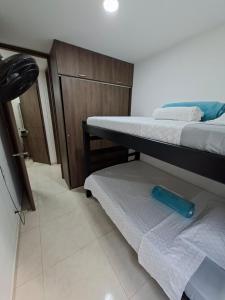 Postel nebo postele na pokoji v ubytování Apartamento en condominio con piscina