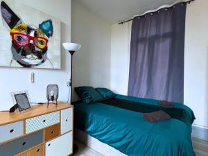 Ένα ή περισσότερα κρεβάτια σε δωμάτιο στο Le Nido