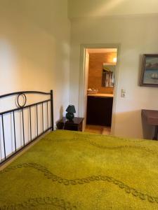 Postel nebo postele na pokoji v ubytování Το Ράντζο του Λυμπέρη