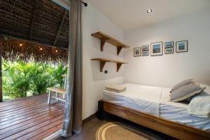 Ένα ή περισσότερα κρεβάτια σε δωμάτιο στο Panama Kite Center